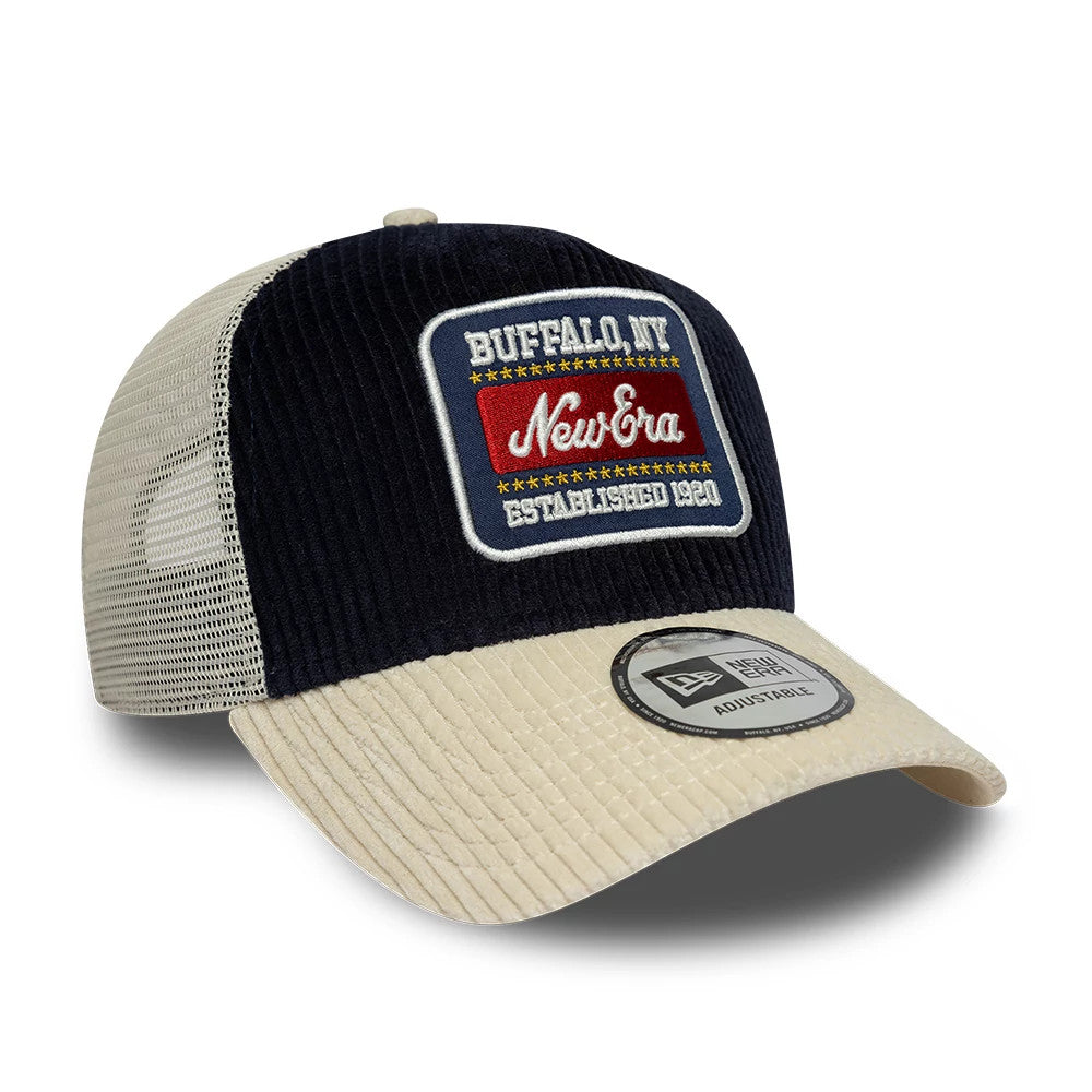 Pictured is this New Era Cord Visor 9FORTY E-Frame Trucker cap in navy. 3
