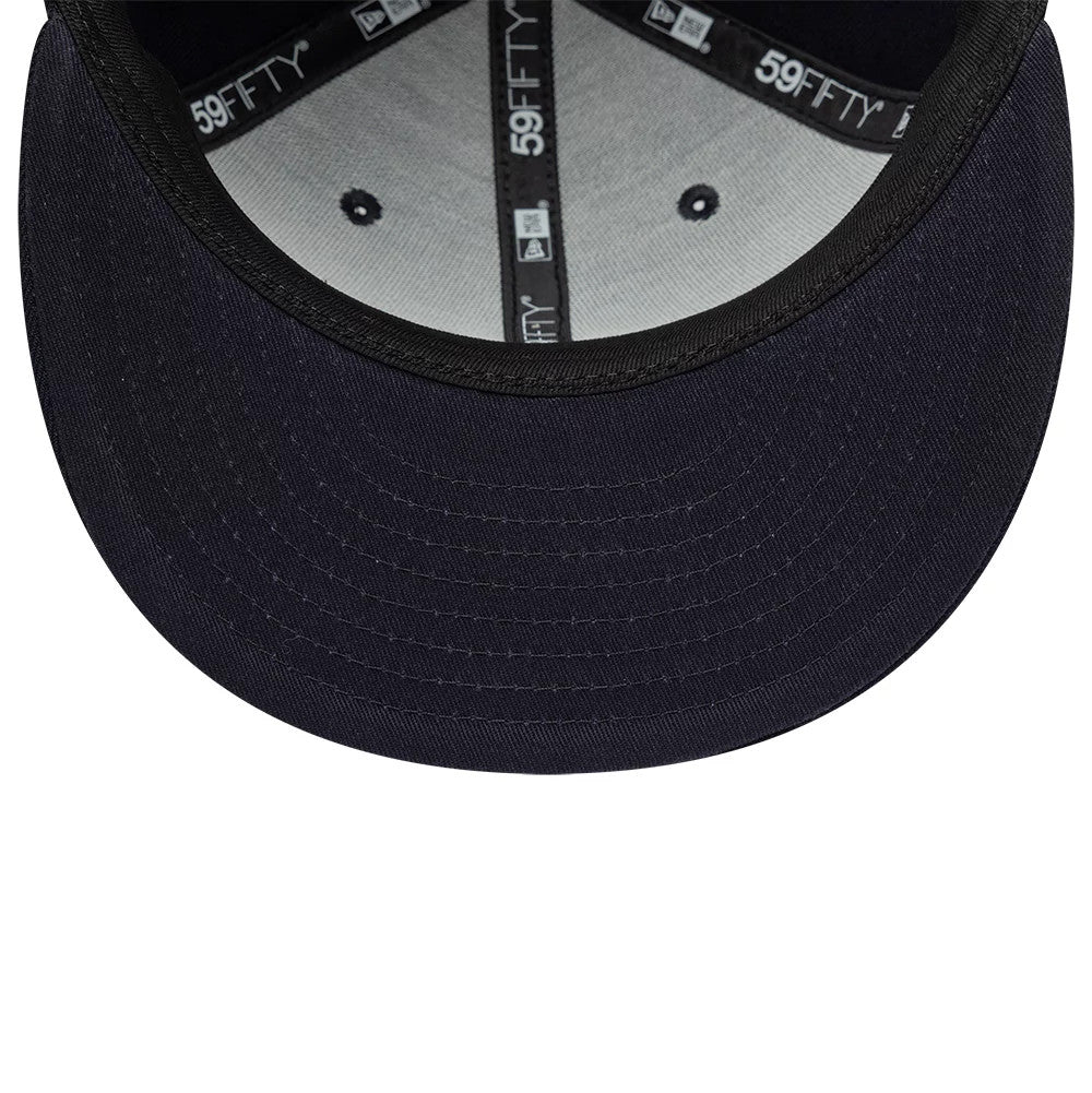 Pictured is this New Era Gem Patch Distress 59FIFTY Fitted cap in navy. 5