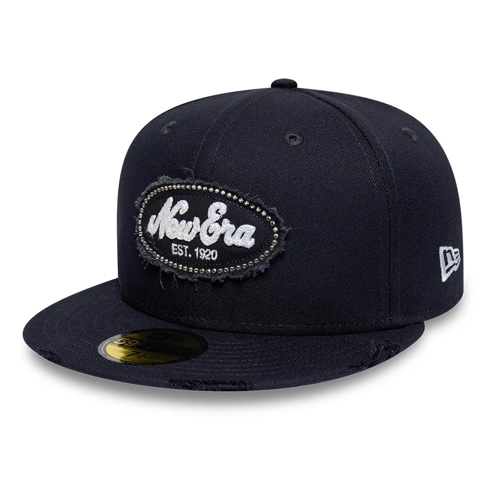Pictured is this New Era Gem Patch Distress 59FIFTY Fitted cap in navy. 1