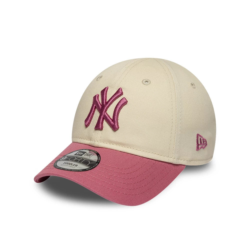 Pictured is this Toddler MLB League Essential New York Yankees 9FORTY cap in light beige & pink. 1