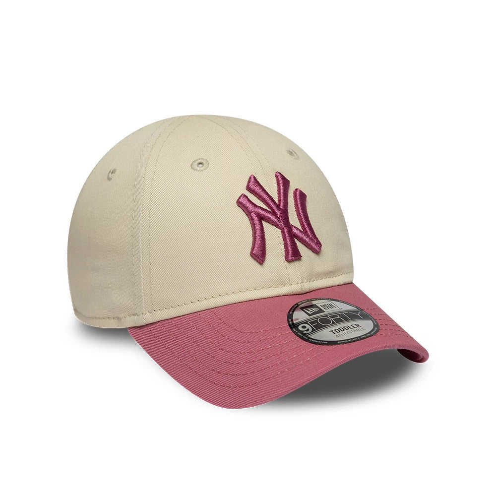 Pictured is this Toddler MLB League Essential New York Yankees 9FORTY cap in light beige & pink. 3