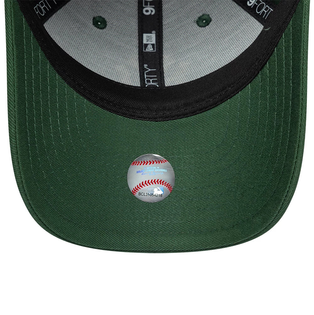 New York Yankees Youth MLB Metallic Dark Green New Era 9FORTY Adjustable Cap, inside view showing the black taping with logos, the grey sweatband, and the underside of the dark green visor with a baseball graphic sticker.