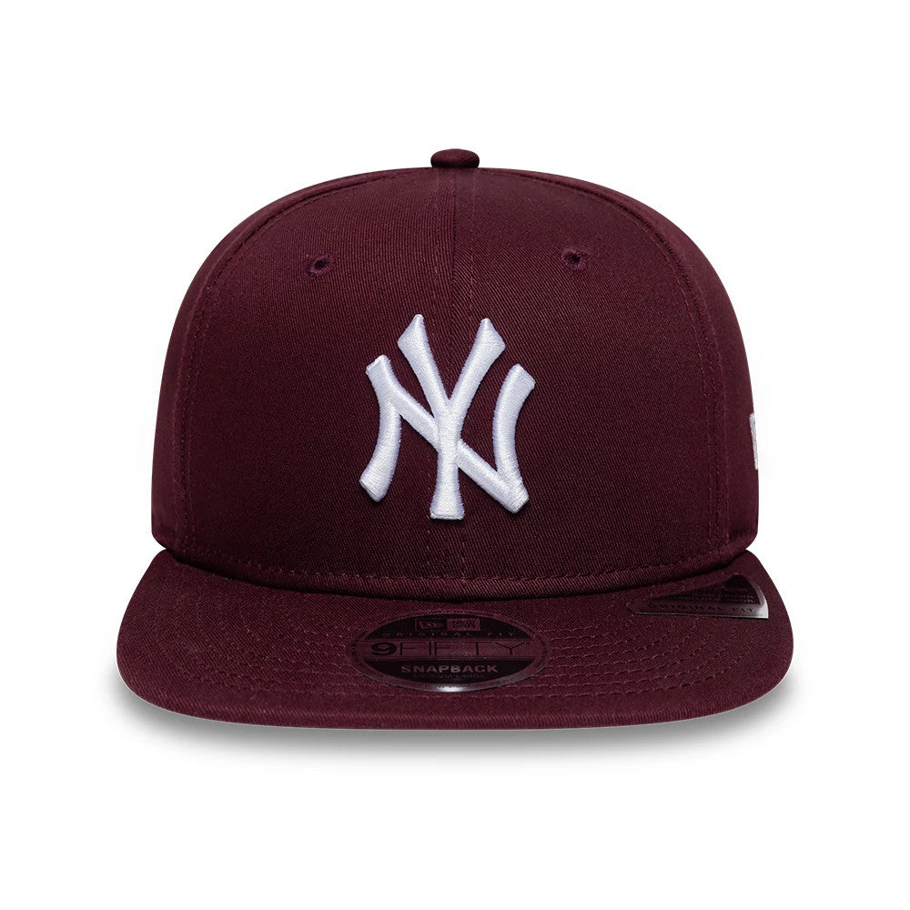Yankees MLB League Essential Purple New Era 9FIFTY Original Fit Snapback Adjustable Cap, front view showing a white embroidered Yankees logo on the structured purple crown, purple flat visor with a black 9FIFTY size sticker.