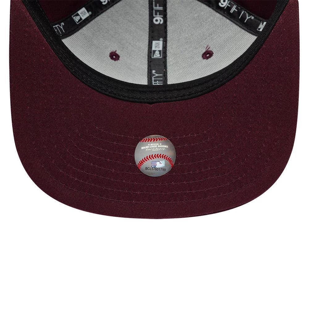 Pictured is this MLB League Essential New York Yankees 9FIFTY Original Fit cap in dark purple. 5