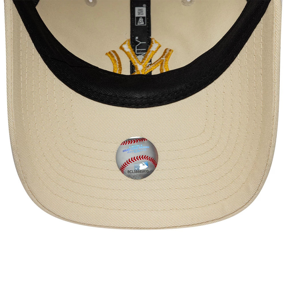 Pictured is this MLB League Essential New York Yankees 9TWENTY cap in light beige. 5