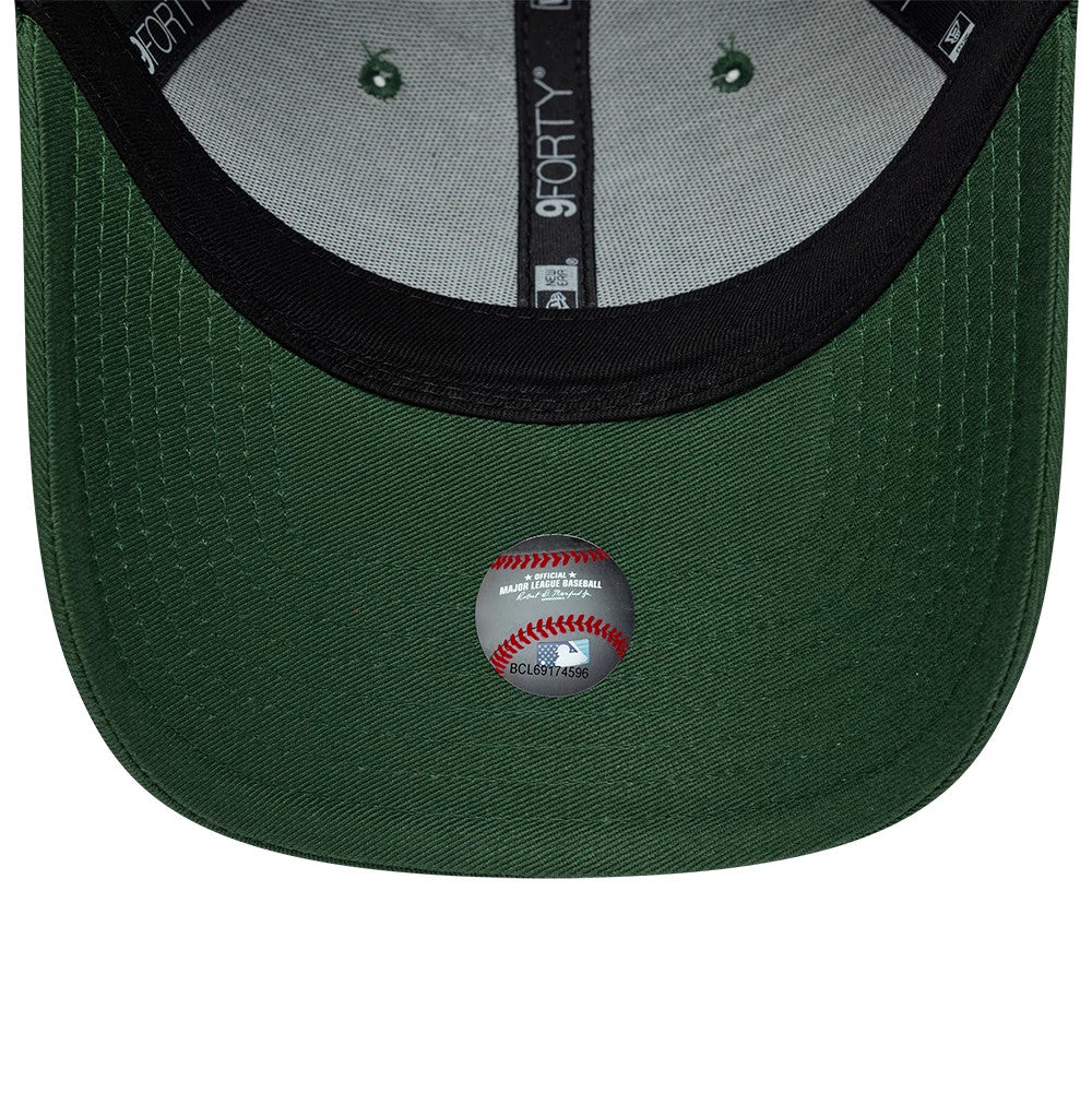 LA Dodgers MLB Team Outline Dark Green New Era 9FORTY Adjustable Cap, inside view showing the grey sweatband and taping with black 9FORTY branding, green undervisor, and an MLB authentication hologram sticker.