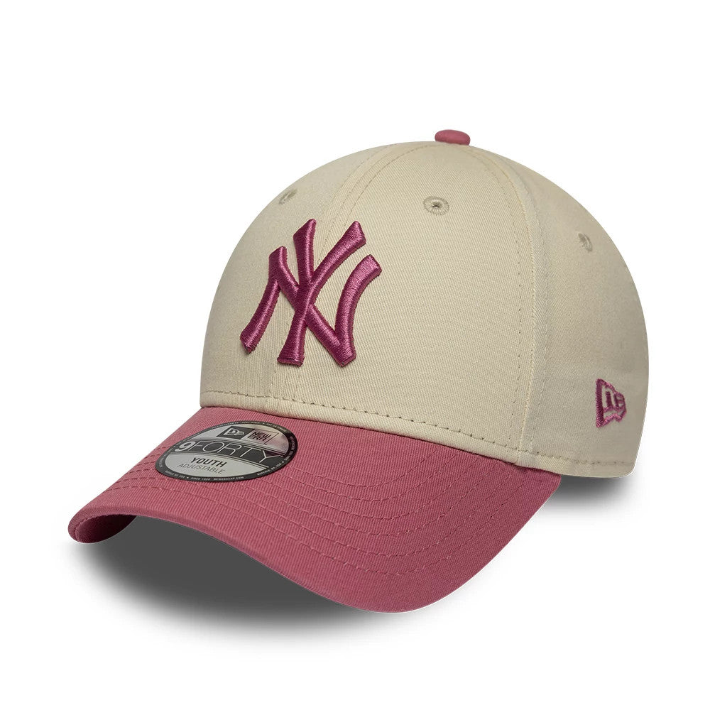 Pictured is this Youth MLB League Essential New York Yankees 9FORTY cap in light beige & pink. 1