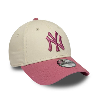 Pictured is this Youth MLB League Essential New York Yankees 9FORTY cap in light beige & pink. 3
