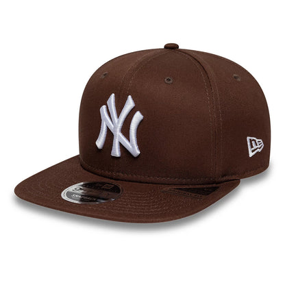Pictured is this MLB League Essential New York Yankees 9FIFTY Original Fit cap in brown. 1
