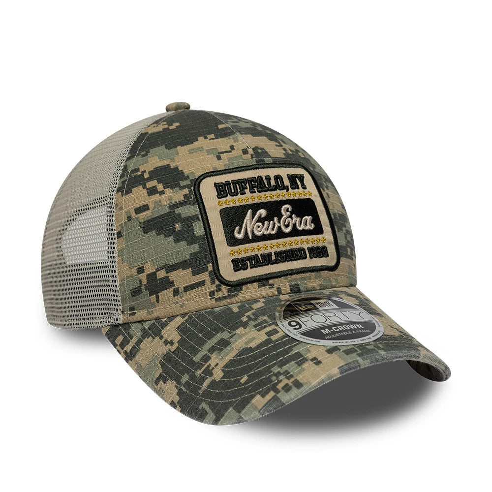 Pictured is this New Era Camo 9FORTY M-Crown A-Frame Trucker cap in woodland camo. 3