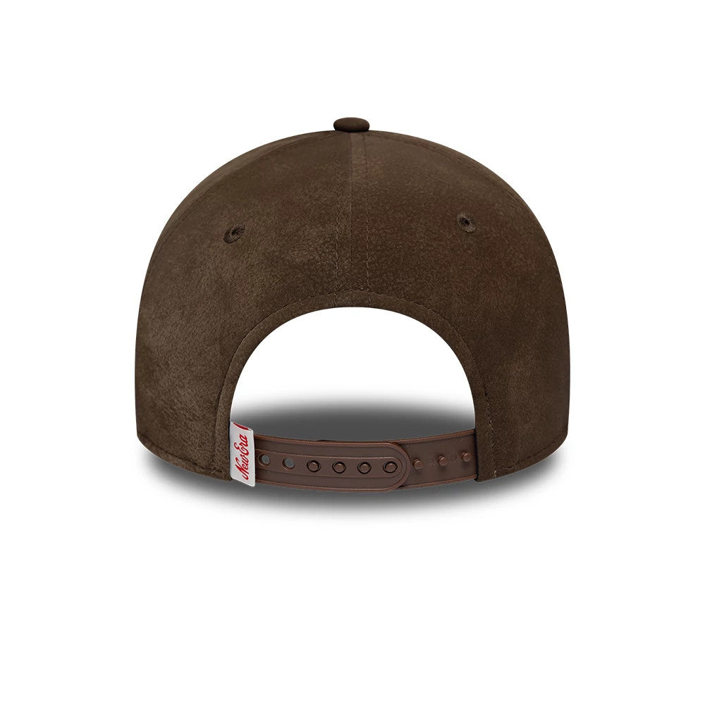 Pictured is this New Era Moto Patch PU 9FORTY E-Frame cap in brown. 4