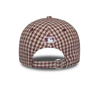 Pictured is this Womens MLB Houndstooth New York Yankees 9FORTY M-Crown cap in dark red. 4
