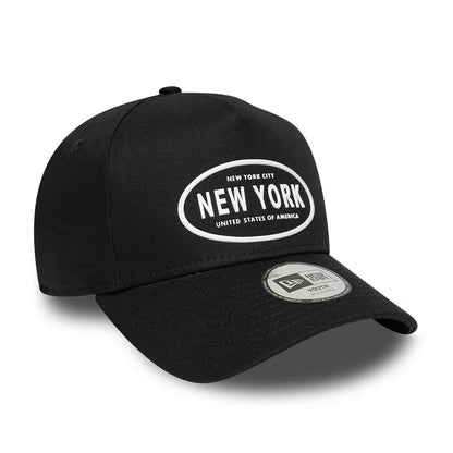 Youth New Era Rubber Black 9FORTY E-Frame Adjustable Cap, three-quarter view showing a raised black and white New York graphic on the front panel, pre-curved black visor with a 9FORTY size sticker, and top button detail.
