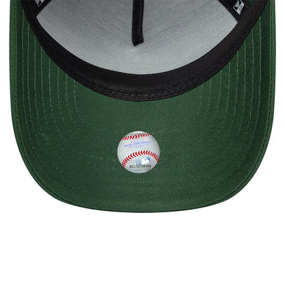 Youth New Era Rubber Dark Green 9FORTY E-Frame Adjustable Cap, inside view featuring a light grey undervisor with black sweatband, a baseball graphic sticker at the centre, and contrast stitching along the dark green visor edge.