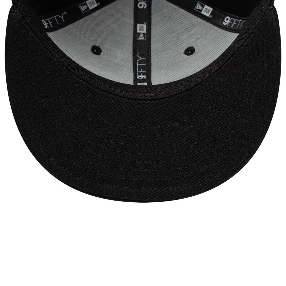 Youth Teenage Mutant Ninja Turtles Black New Era 9FIFTY Snapback Adjustable Cap, inside view showing grey undervisor, black taping with repeated 9FIFTY branding, and a black sweatband contrasting with grey fabric lining the structured crown.