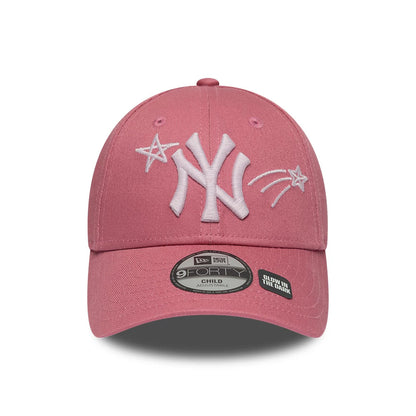 Yankees Child MLB Space Glow In The Dark Pink New Era 9FORTY Adjustable Cap, front view showing the white embroidered NY logo flanked by star and comet designs on the pink structured crown, with a 9FORTY size sticker on the visor.