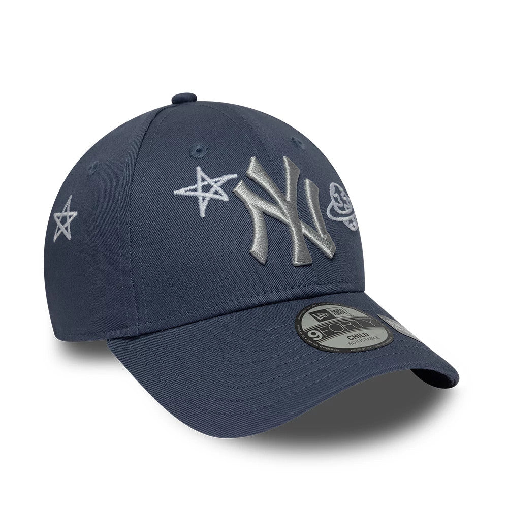 Yankees Child MLB Space Glow In The Dark Blue New Era 9FORTY Adjustable Cap, three-quarter view showing grey raised embroidered NY logo on the front panel with star and planet designs, a structured blue crown.