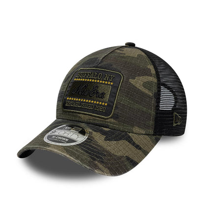 Pictured is this New Era Camo 9FORTY M-Crown A-Frame Trucker cap in dark green. 1