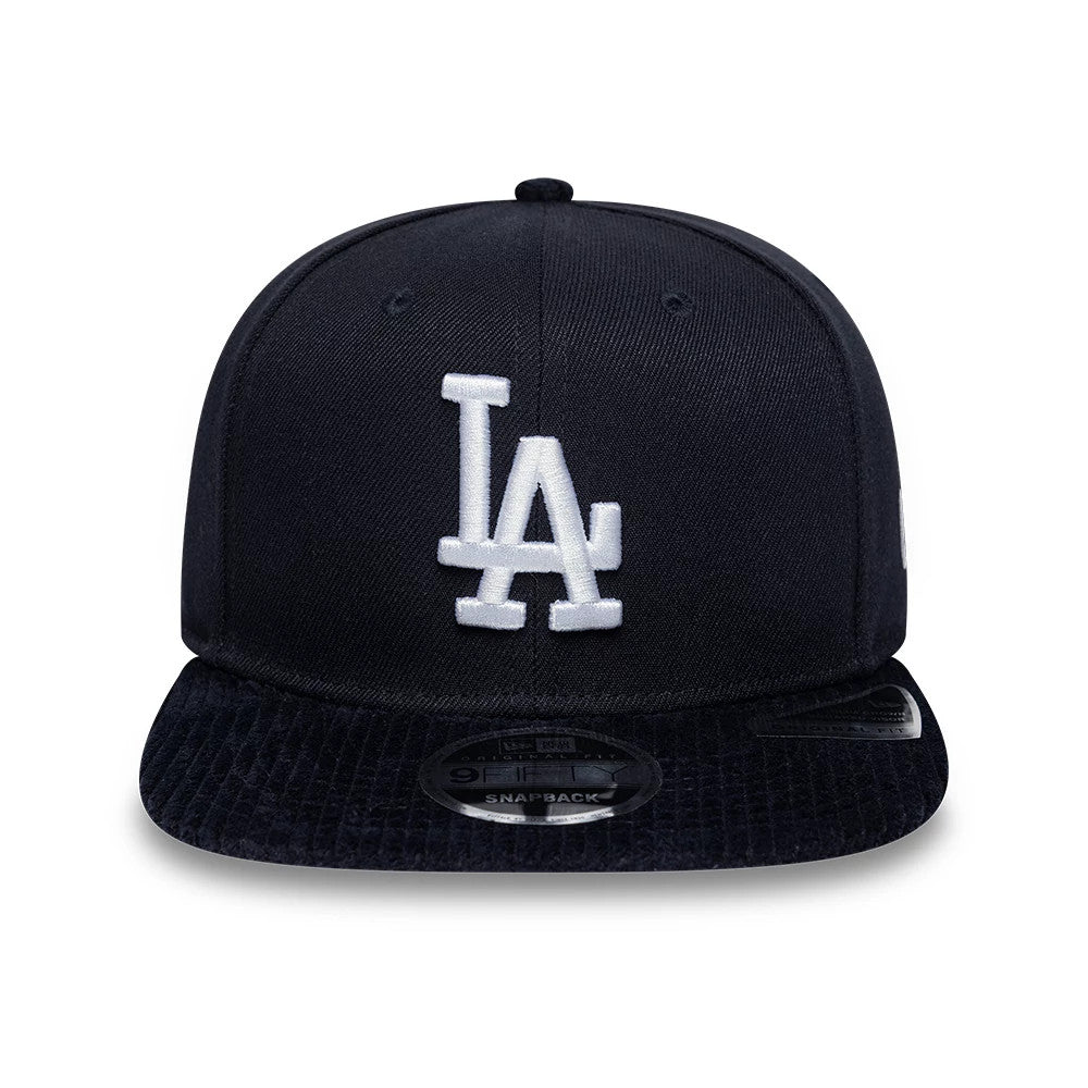 Dodgers MLB Cord Visor Navy New Era 9FIFTY Original Fit Snapback Adjustable Cap, front view showing the raised white embroidered LA logo on the structured navy crown, with a corduroy-style navy visor and a 9FIFTY size sticker on the top.