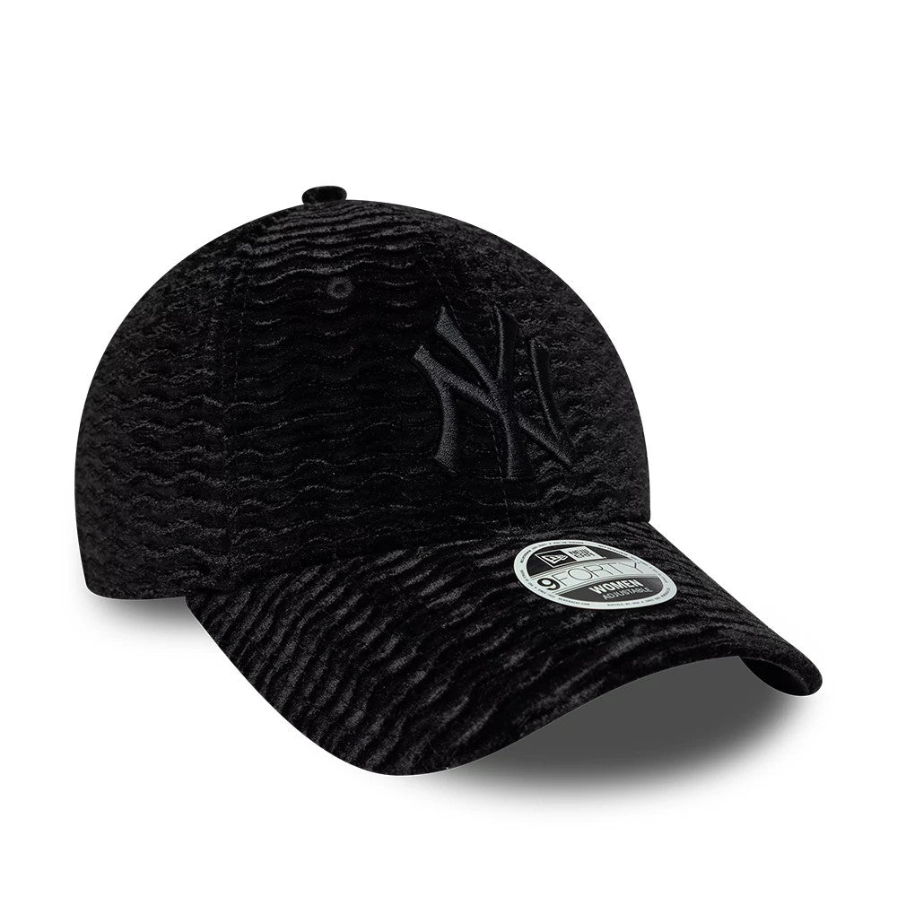 New York Yankees Womens MLB Velour Black New Era 9FORTY Adjustable Cap, three-quarter view showing the raised black embroidered NY logo on the front panel, curved black visor with a 9FORTY size sticker, and rich velour texture across the crown.