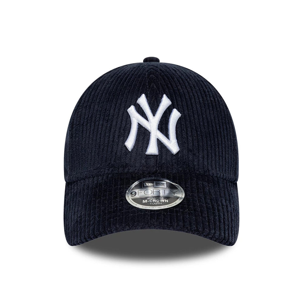 New York Yankees Youth MLB Cord Navy New Era 9FORTY M-Crown Adjustable Cap, front view showing a prominent white NY logo in raised embroidery on the structured corduroy crown, with the curved visor featuring a 9FORTY size sticker.