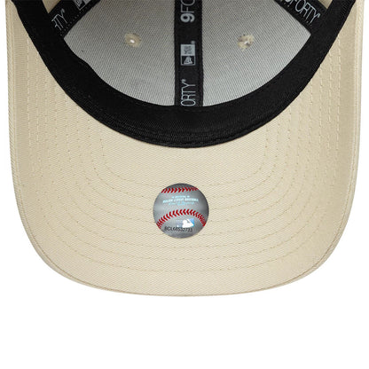 LA Dodgers Youth MLB Heart Icon Light Beige New Era 9FORTY Adjustable Cap, inside view showing the light beige undervisor, black sweatband with printed New Era logo and 9FORTY taping, and an MLB holographic sticker on the flat black visor.