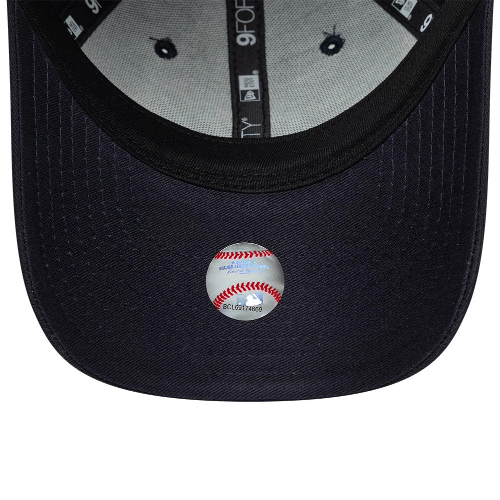 New York Yankees Youth MLB Heart Icon Navy New Era 9FORTY Adjustable Cap, inside view showing the grey sweatband, black taping with New Era branding, and a detailed baseball graphic sticker on the black undervisor.