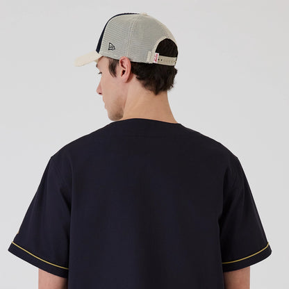 The model is wearing this New Era Straight Hem Jersey in navy. 7