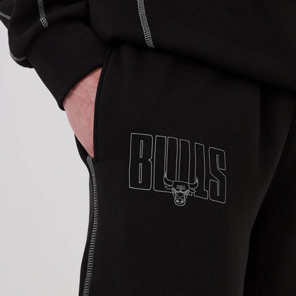 The model is wearing this NBA Graphic Chicago Bulls Straight Leg Joggers in black. 5