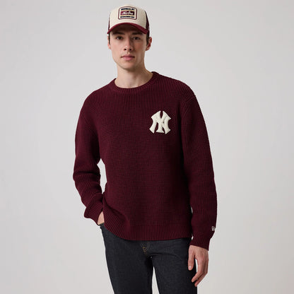 The model is wearing this MLB Waffle Knit New York Yankees Crew Neck Sweater in dark purple. 3