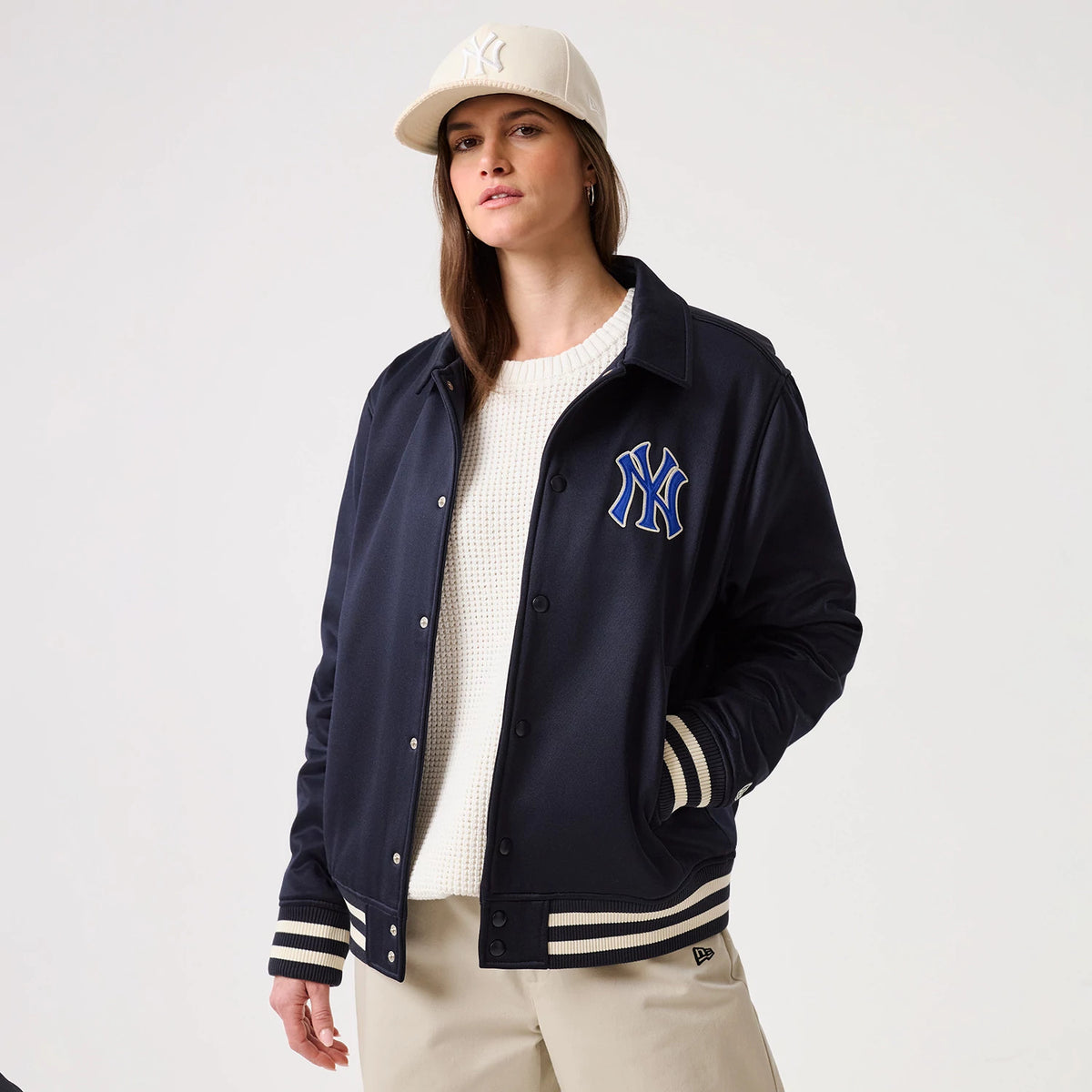 The model is wearing this MLB New York Yankees Collared Jacket in navy. 4