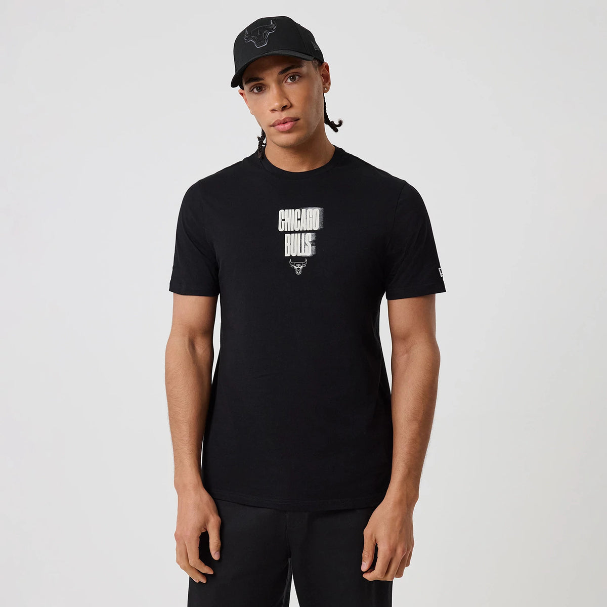 The model is wearing this NBA Graphic Chicago Bulls T-Shirt in black. 3