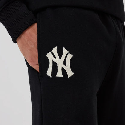 The model is wearing this MLB New York Yankees Wide Leg Joggers in black. 3