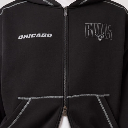 The model is wearing this NBA Graphic Chicago Bulls Pullover Hoodie in black. 6