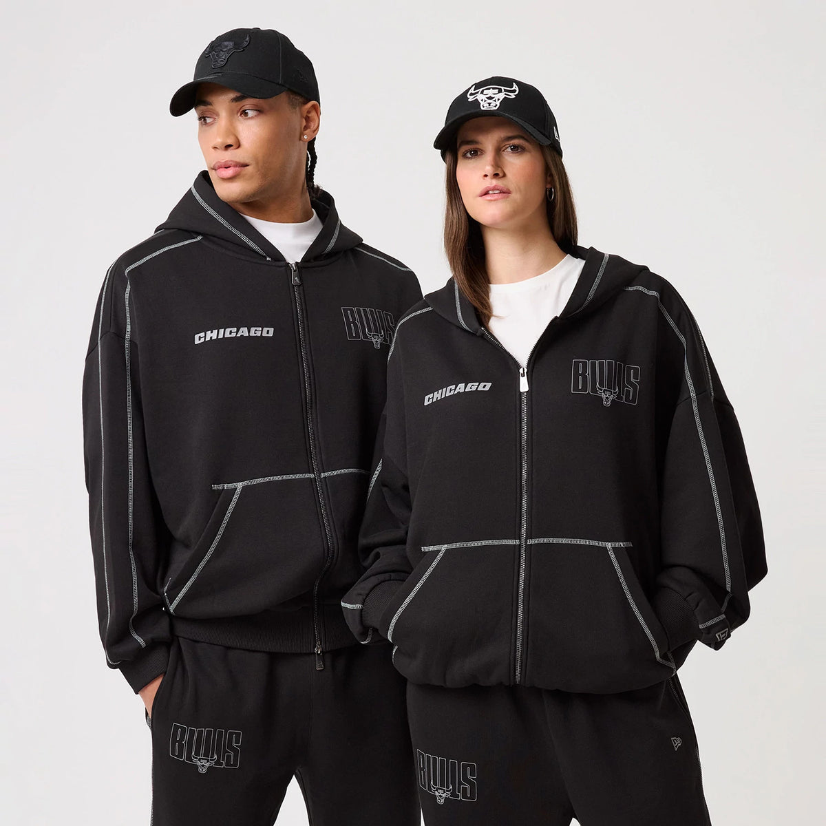 The model is wearing this NBA Graphic Chicago Bulls Pullover Hoodie in black. 1