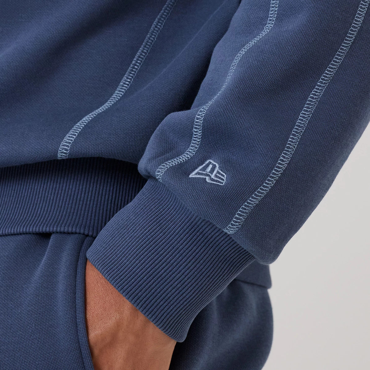 The model is wearing this NBA Graphic LA Lakers Crew Neck Sweater in dark blue. 7