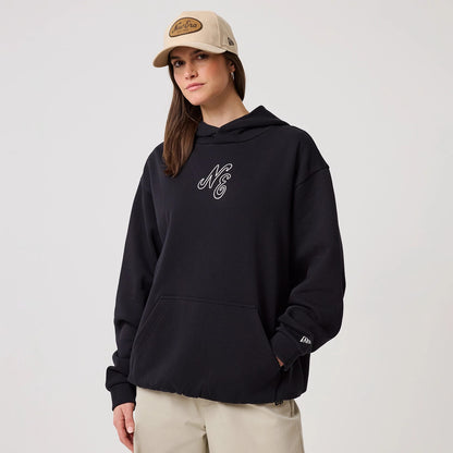 The model is wearing this New Era Crest Graphic Pullover Hoodie in navy. 4