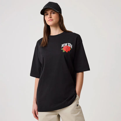 The model is wearing this New Era Floral Graphic T-Shirt in black. 4