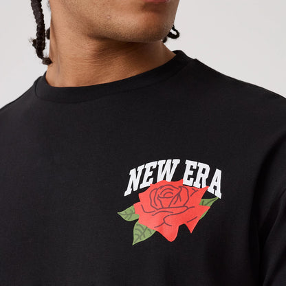 The model is wearing this New Era Floral Graphic T-Shirt in black. 5