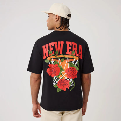 The model is wearing this New Era Floral Graphic T-Shirt in black. 2
