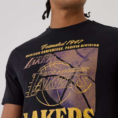 The model is wearing this NBA Graphic LA Lakers T-Shirt in black. 4