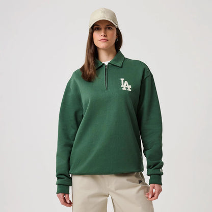 The model is wearing this MLB LA Dodgers 1/4 Zip Sweater in dark green. 4