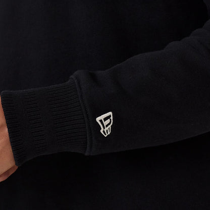 The model is wearing this MLB New York Yankees 1/4 Zip Sweater in black. 7
