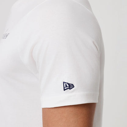The model is wearing this MLB Linear New York Yankees T-Shirt in white. 7