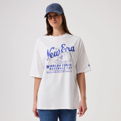 The model is wearing this New Era Heritage Oversized T-Shirt in white. 4