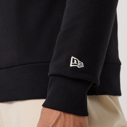 The model is wearing this MLB Linear New York Yankees Crew Neck Sweater in black. 7