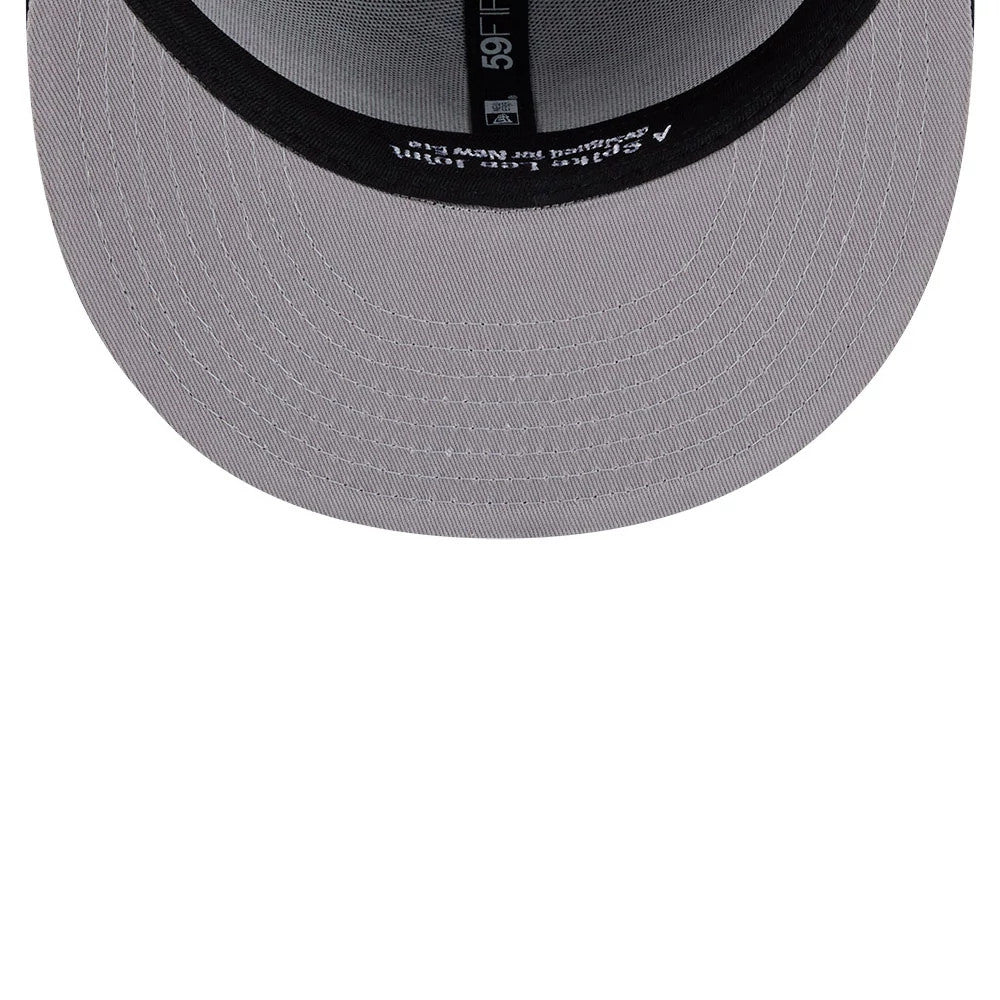 Pictured is this MLB X Spike Lee Crossed Bats New York Yankees 59FIFTY Fitted cap in navy. 2