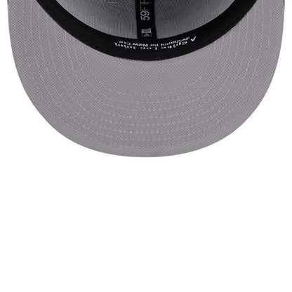 Pictured is this MLB X Spike Lee Crossed Bats New York Yankees 59FIFTY Fitted cap in navy. 2