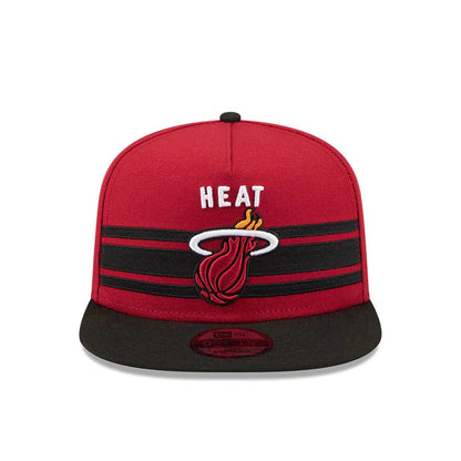 Miami Heat NBA Tip Off 2026 Dark Red New Era 9FIFTY A-Frame Snapback Adjustable Cap, front view showing the raised Heat logo and text in white and red embroidery on the dark red crown, with a black flat visor and red 9FIFTY size sticker.