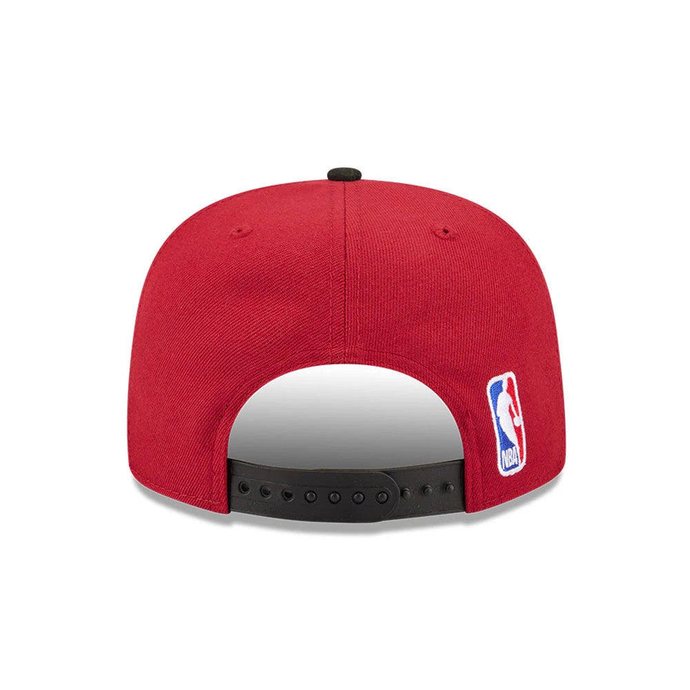 Miami Heat NBA Tip Off 2026 Dark Red New Era 9FIFTY A-Frame Snapback Adjustable Cap, rear view showing the embroidered NBA logo on the right side above the black adjustable snapback closure, with a dark red structured crown and matching eyelets.